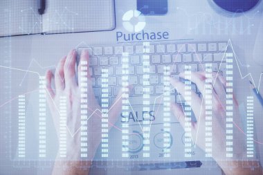 Dizüstü bilgisayar klavyesini ve ön x çizim hologramını yazarken çift pozlama. Üst Manzara. Finans piyasası kavramı.