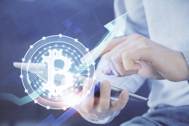 Erkeklerin el ele tutuşmalarının ve telefon ve kripto para birimi engelleme teması çiziminin iki kez görüntülenmesi.