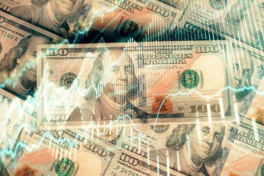 Forx grafiğinin çok sayıda görüntüsü bize dolar banknotları arka planında görünüyor. Finansal başarı piyasası kavramı.