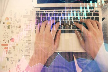 Dizüstü bilgisayar klavyesini ve ön x çizim hologramını yazarken çift pozlama. Üst Manzara. Finans piyasası kavramı.