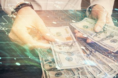 Teknolojinin iki katına çıkması hologram, dolar banknotları ve insan eli. Veri kavramı