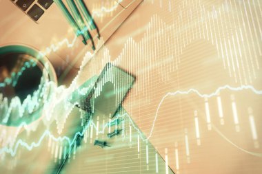 Bilgisayarla masaüstü arkaplanı üzerinde ön x grafik çizimi çift pozlama. Finansal analiz kavramı. Üst görünüm.