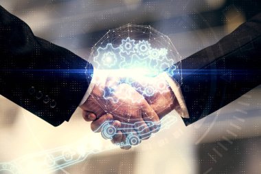 İki kişinin veri temalı hologramı ve el sıkışması. Bilişim endüstrisi konseptinde ortaklık.