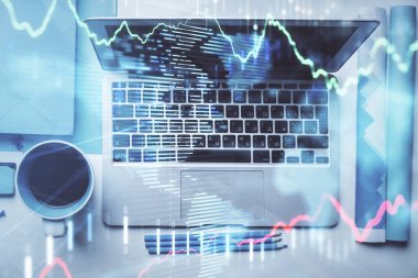 Bilgisayarla masaüstü arkaplanı üzerinde ön x grafik çizimi çift pozlama. Finansal analiz kavramı. Üst görünüm.