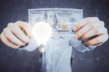 Ampulün hologram çizimi, Amerikan doları banknotları ve insan eli. İş Fikri konsepti.