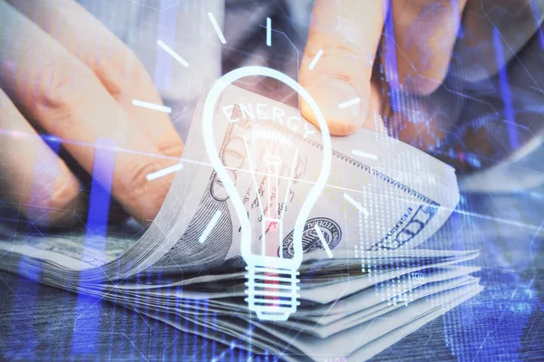 Multi exponering av glödlampa rita hologram och USA dollar räkningar och manshänder. Affärsidé. — Stockfoto