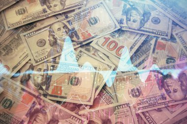 Forx grafiğinin çok sayıda görüntüsü bize dolar banknotları arka planında görünüyor. Finansal başarı piyasası kavramı.