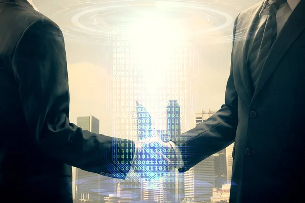 stock image Double exposure of data theme hologram and handshake of two men. Partnership in IT industry concept.