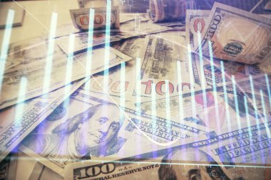 Forx grafiğinin çok sayıda görüntüsü bize dolar banknotları arka planında görünüyor. Finansal başarı piyasası kavramı.