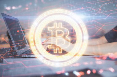 Bilgisayarda ve kripto piyasa temalı hologram çizimlerinde kadın elinin çifte pozu. Engelleme zinciri kavramı.