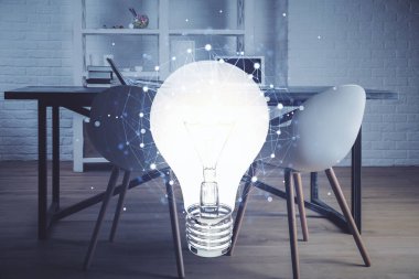 Ampul ve ofis içi arka planının iki katı. Fikir kavramı.