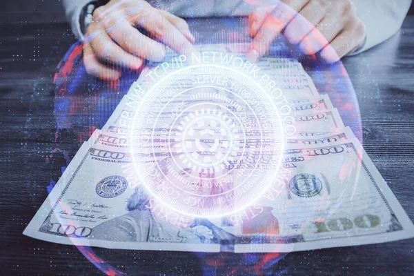 Multi exposure of Tech drawing hologram and USA dollars bills and man hands. Technology concept.