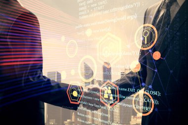 İki kişinin veri temalı hologramı ve el sıkışması. Bilişim endüstrisi konseptinde ortaklık.