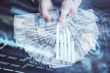 Teknolojinin hologramı, Amerikan dolarları ve insan eli çizimleri. Teknoloji konsepti.