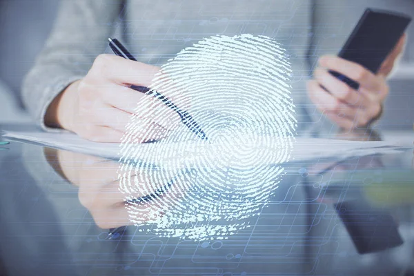 Double exposure of fingerprint hologram and woman holding and using a mobile device. Security concept.