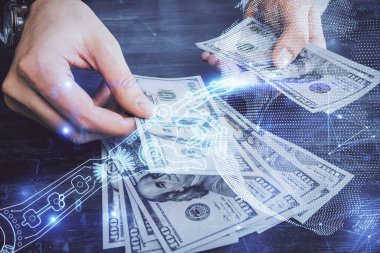 Teknolojinin hologramı, Amerikan dolarları ve insan eli çizimleri. Teknoloji konsepti.