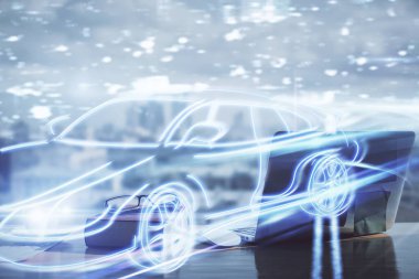 Otomobil teknisyeni çizimi ve açık defter geçmişi olan bir masa. Teknoloji kavramı