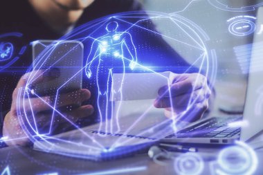 Bir adamın elini tutarken ve telefon ve eğitim teması kullanırken çift pozlama.