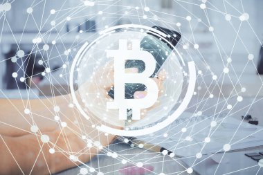 Bir adamın elini tutarken ve telefon ve kripto para birimi engelleme teması kullanırken çift pozlama.