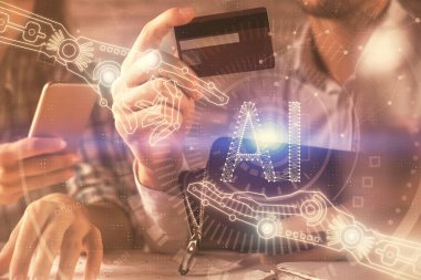 Bir kredi kartı ve veri temalı hologram çizimi tutan kadın ve erkeğin online alışverişine iki kez maruz kalıyorlar. Ai ve E-ticaret çevrimiçi ücret konsepti.
