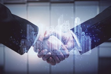 Şehrin iki kez görüntülenmesi hologramı ve iki adamın el sıkışması. İnşaat yönetimi.