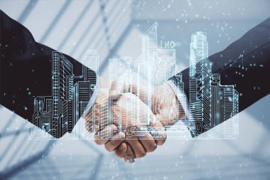 Şehrin iki kez görüntülenmesi hologramı ve iki adamın el sıkışması. İnşaat yönetimi.