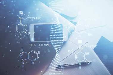 Telefonunla masanın üzerine DNA çizimi yapılmış. Üst Manzara. Bilim eğitimi kavramı.