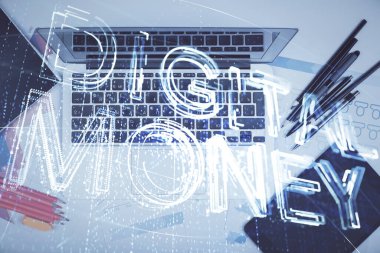 Masaüstü arkaplanındaki bilgisayarın üzerinden engelleme temalı hologram çizimleri. Üst Manzara. Çoklu maruz kalma. Kripto ekonomi kavramı.