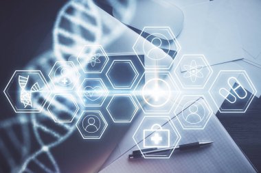 Telefonunla masanın üzerine DNA çizimi yapılmış. Üst Manzara. Bilim eğitimi kavramı.