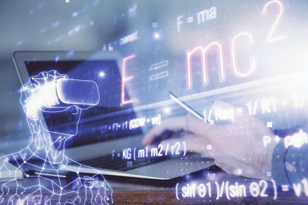 Bir adamın elini tutarken ve telefon ve formüller çizerken iki kez görüntülenmiş. Eğitim kavramı.