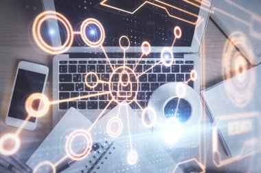 Masaüstü arkaplanındaki bilgisayar üzerinden sosyal ağ hologramı çizimleri. Üst Manzara. Çift pozlama.