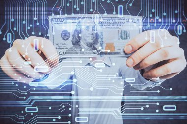 Teknolojinin iki katına çıkması hologram, dolar banknotları ve insan eli. Veri kavramı