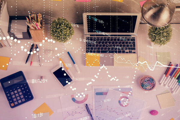 Double exposure of data drawing hologram over topview of study desk background with computer. Concept of Ai.