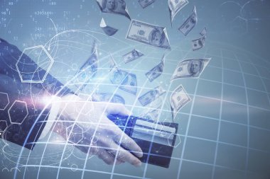 Dünya haritasının iki katına çıkarılması hologram, dolar banknotları ve insan eli..