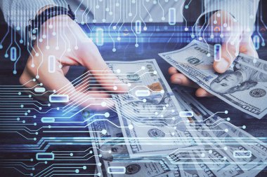 Teknolojinin iki katına çıkması hologram, dolar banknotları ve insan eli. Veri kavramı