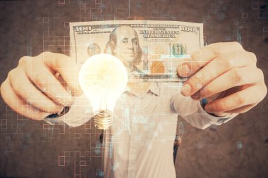 Ampulün hologram çizimi, Amerikan doları banknotları ve insan eli. İş Fikri konsepti.