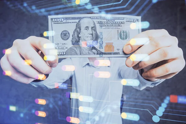 Teknolojinin iki katına çıkması hologram, dolar banknotları ve insan eli. Veri kavramı