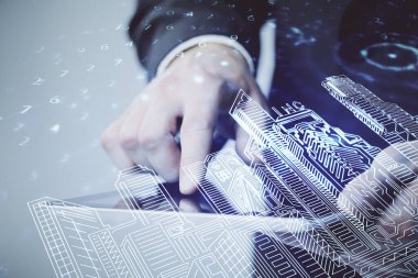 Dijital bir cihaz ve şehir çizimi kullanarak insanın ellerini tutarken çift pozlama.