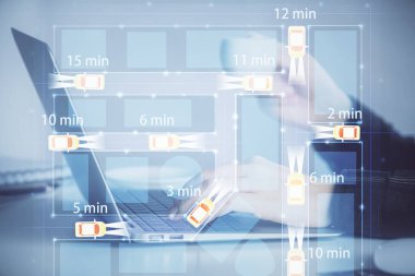 Bilgisayarda ve otomobil temalı çizimlerde kadın elinin çifte pozu. Yüksek Teknoloji kavramı.