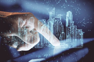 Dijital bir cihaz ve şehir çizimi kullanarak insanın ellerini tutarken çift pozlama.