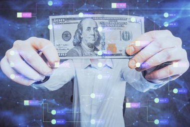 Teknolojinin iki katına çıkması hologram, dolar banknotları ve insan eli. Veri kavramı