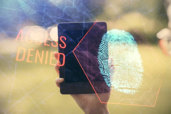 Double exposure of fingerprint hologram and woman holding and using a mobile device. Security concept.