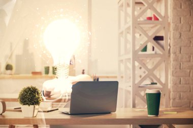 Ampul ve ofis içi arka planının iki katı. Fikir kavramı.