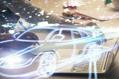 Bilgisayarda ve otomobil temalı çizimlerde kadın elinin çifte pozu. Yüksek Teknoloji kavramı.