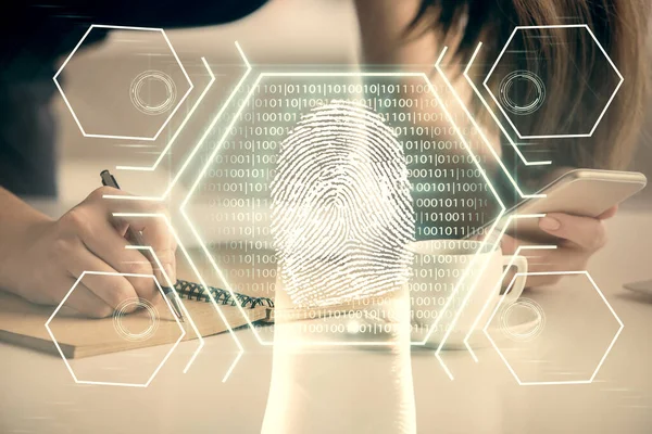 Double exposure of fingerprint hologram and woman holding and using a mobile device. Security concept.