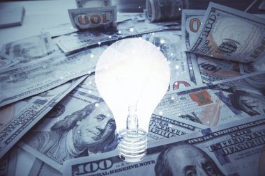 Arka planda Amerikan Doları 'na çekilen ampulün iki katı yansıması. Fikir kavramı.