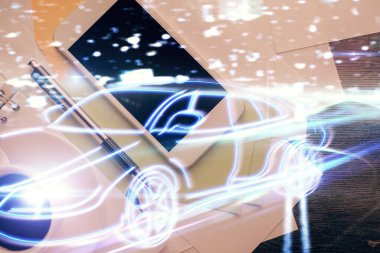 Otomotiv teknolojisi temalı çizimler telefon ile masaya konur. Üst Manzara. Otomatik pilot kavramı.