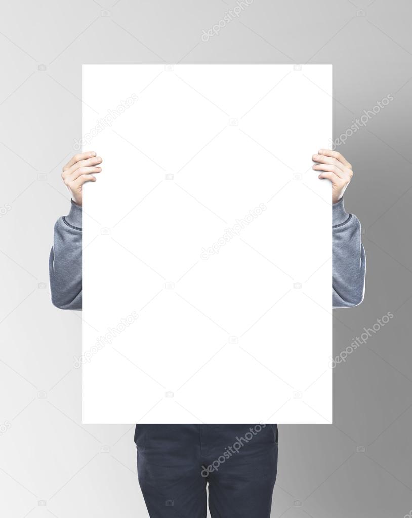 man holding paper