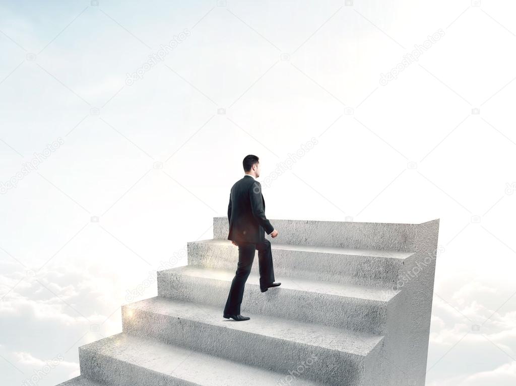 man climbing to stairs