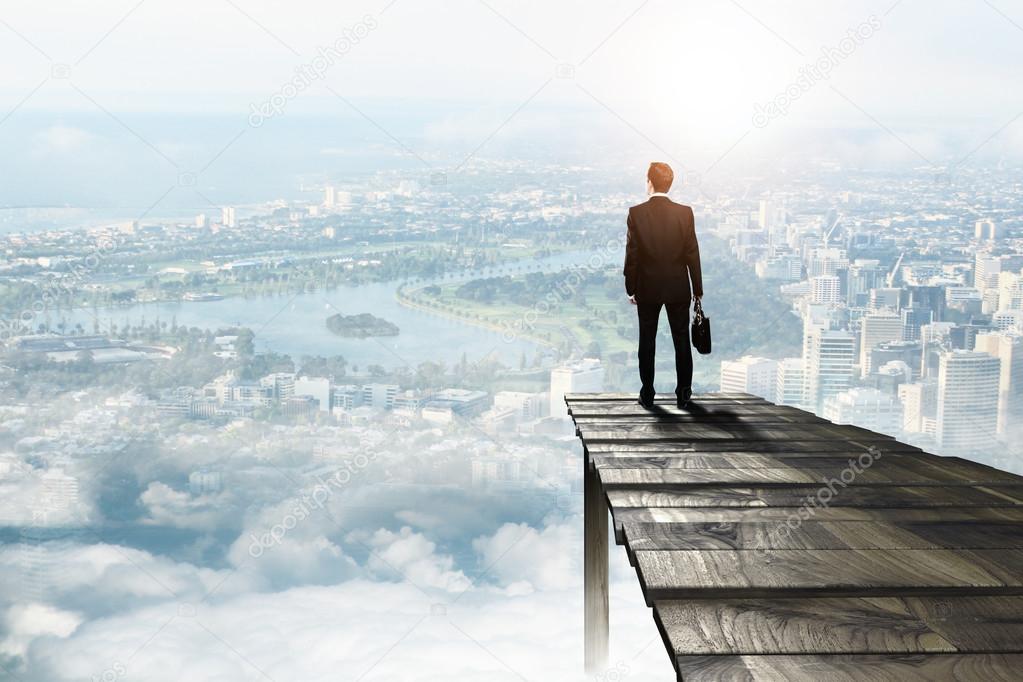 businessman standing on pie